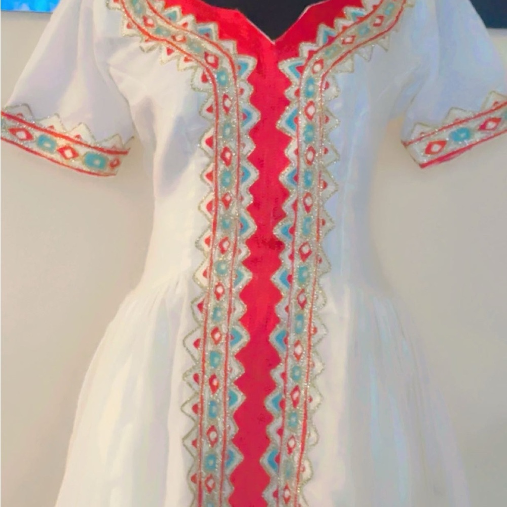 Embroidered White Dress with Red and Blue Accents